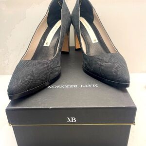 Women’s shoes: Matt Bernson black fine snake heels.